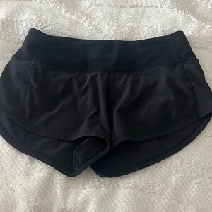 size 2  2.5” black lululemon speed up shorts - discontinued - perfect condition!